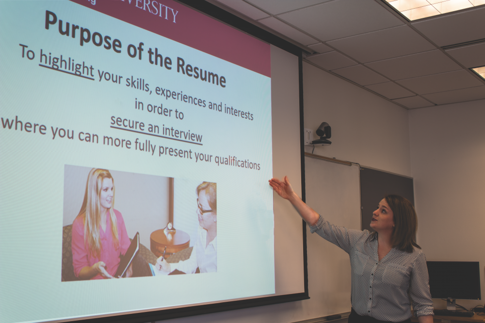 ECS Staff Member presenting on the purpose of Resumes.
