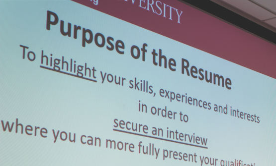ECS Staff Member presenting on the purpose of Resumes.