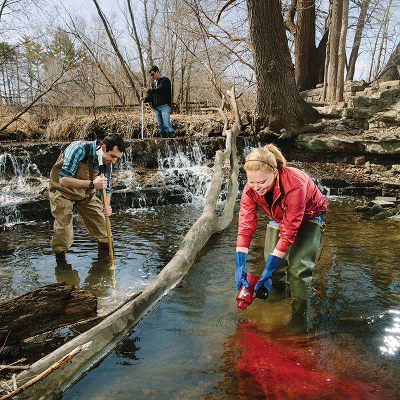 students water sampling creek