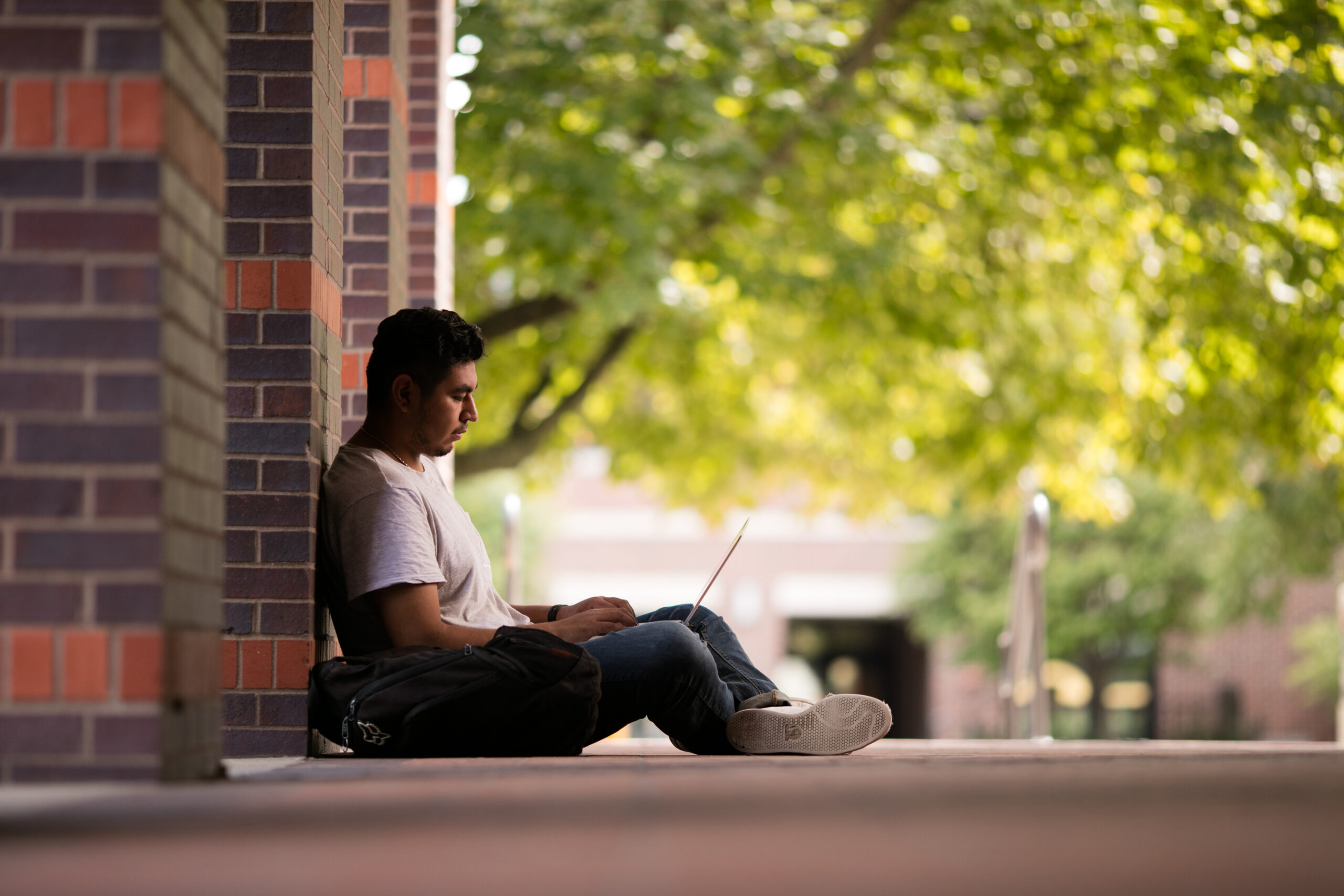 student studying outdoors