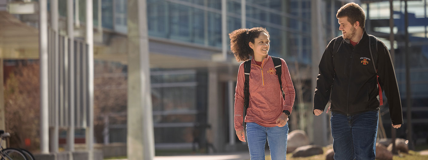 students walking across campus