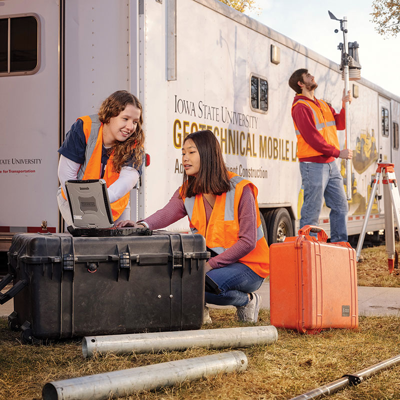 students working with geotechnical mobile lab
