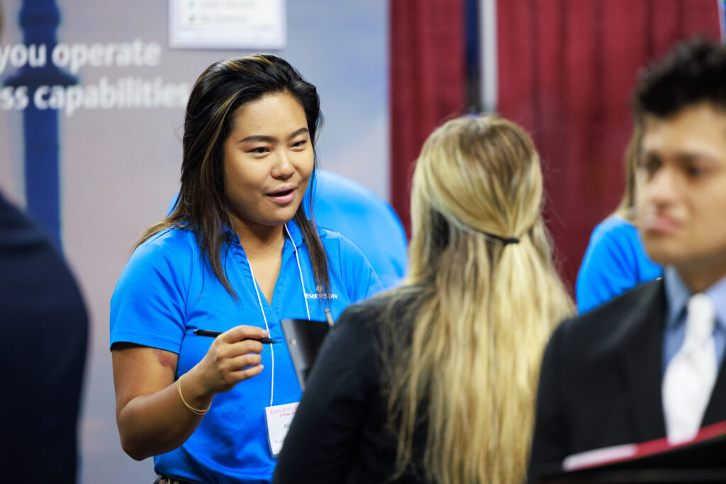 student and employer interact at the career fair