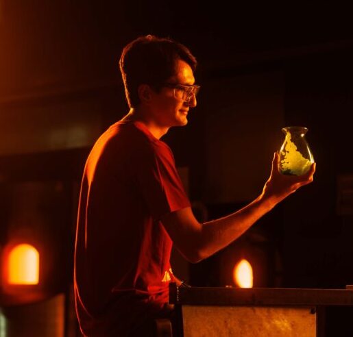 Nick Tader, undeclared engineering student who selected materials engineering, examines blown glass from Iowa State’s own Gaffers Guild