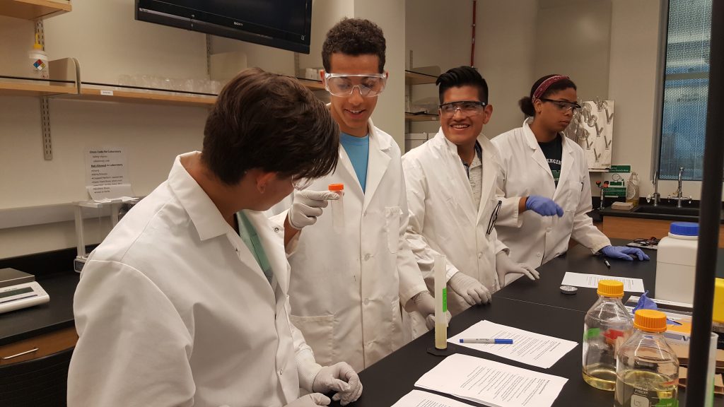 students interact in lab setting