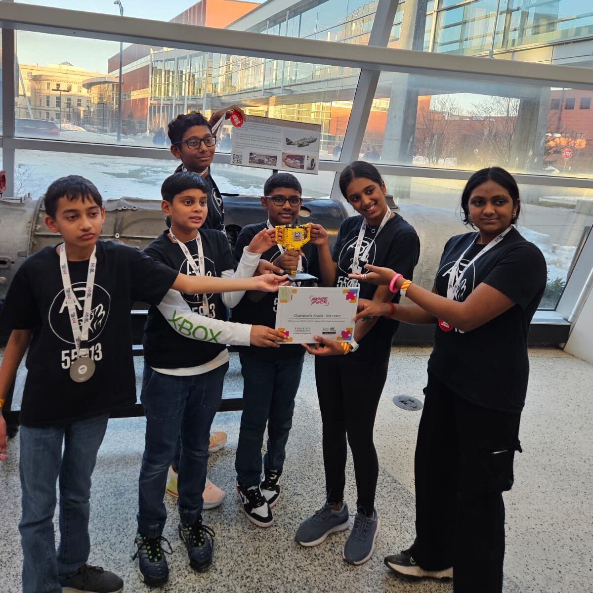 The Alphabots with their state championship trophy and certificates.