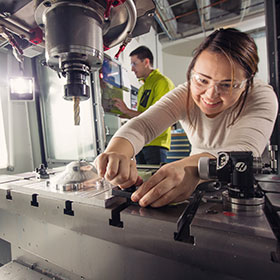 student in manufacturing lab