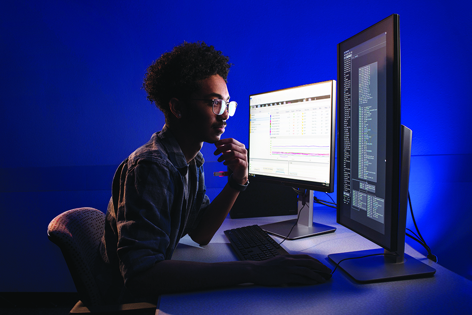 student working on computer