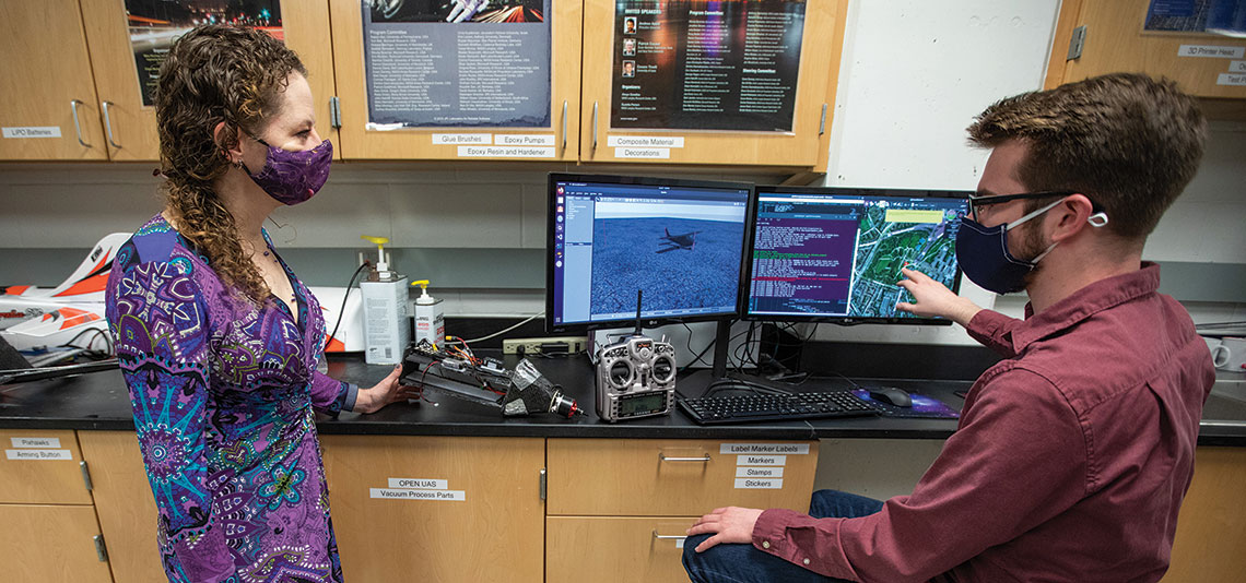 Colton Glick and Kristin Y. Rozier in the lab